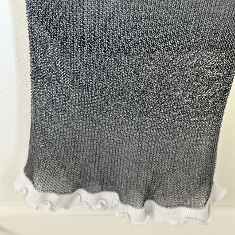 Have to have in your close skirt. Bought it from Saks